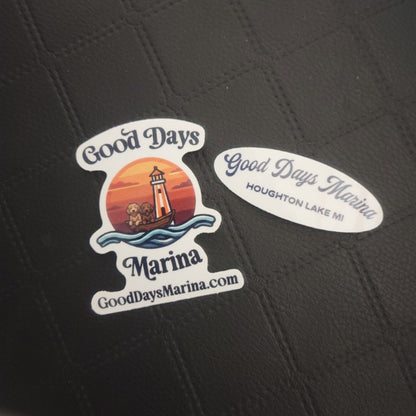 InkBird Print Studio die cut vinyl stickers: sunset dog lighthouse scene, oval marina design, glossy finish, vivid colors on dark backdrop.