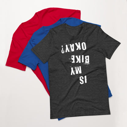 Stack of three tees—red, blue, and InkBird Print Studio’s “Is My Bike Okay?” shirt with white distressed upside-down text.